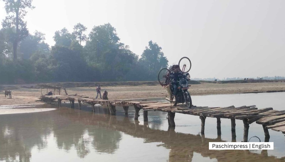 Compulsion to use wooden bridge to cross Doda river